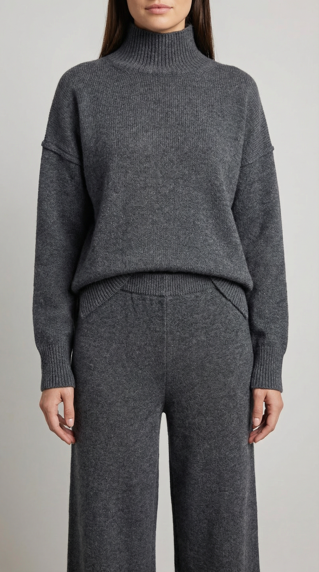 Conjunto de suéter de punto de cuello alto y pantalones vaqueros