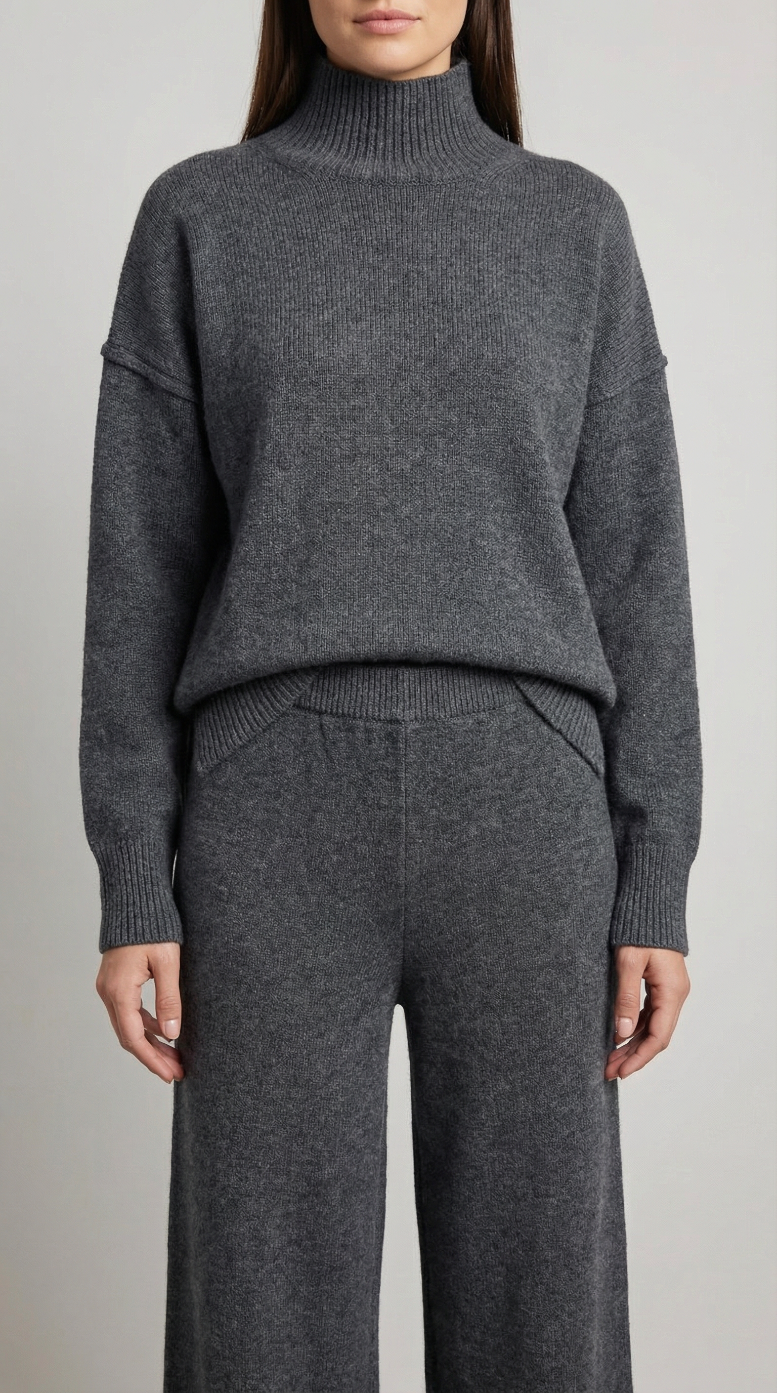 Conjunto de suéter de punto de cuello alto y pantalones vaqueros