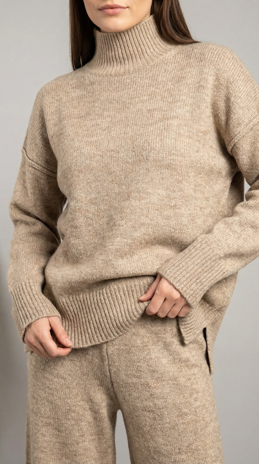 Conjunto de suéter de punto de cuello alto y pantalones vaqueros